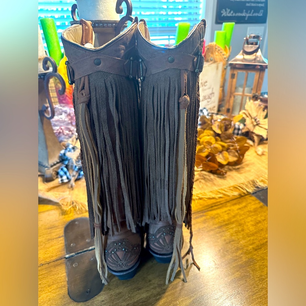 Amazing corral boots. Lots of fringe, studs, eye catcher!!